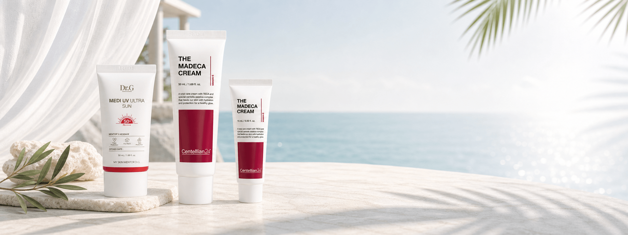 Dr.G sunscreen and Centellian24 Madeca creams on a bright seaside resort terrace